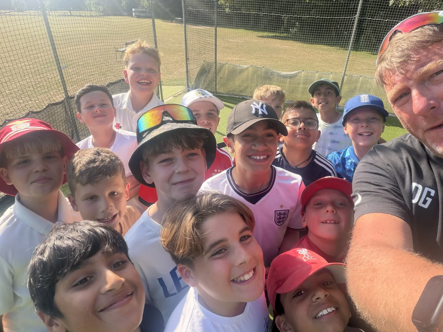 David Goodchild with a group of young DG Cricket players